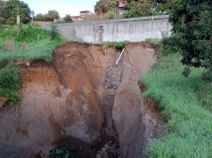 SCT inicia reparación de socavón en Tlatlauquitepec